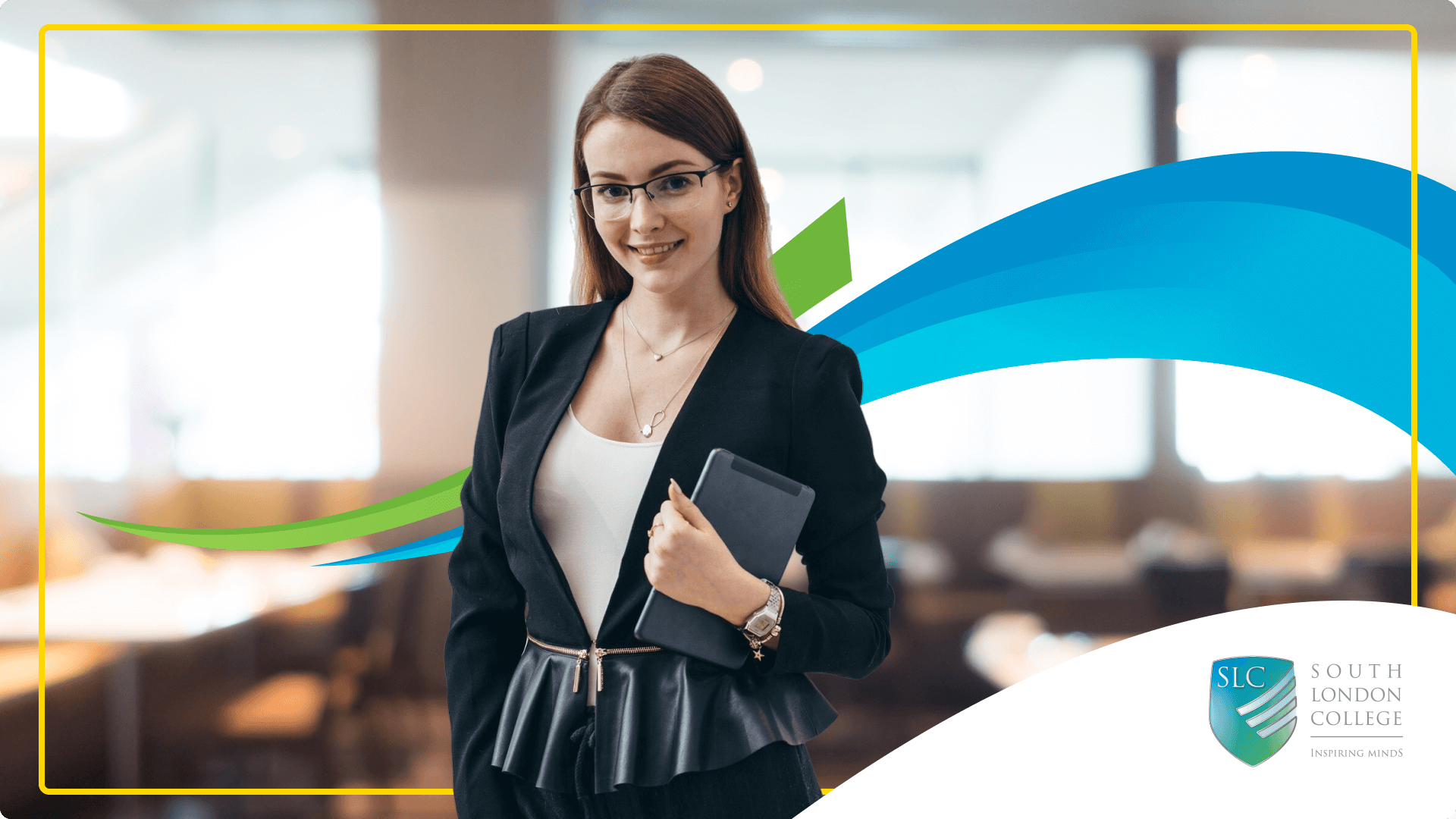 Smiling woman in blazer holds tablet in bright office.
