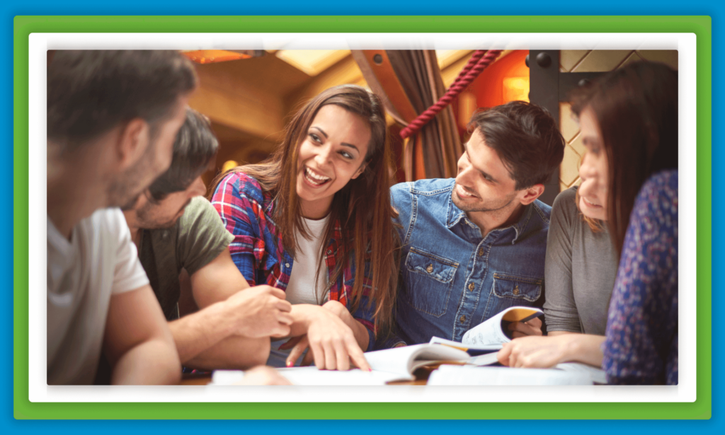 
A group of friends is studying together at a table.