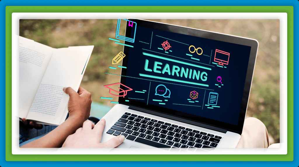 Online learning concept with a laptop and a book.
