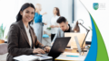 A smiling woman in brown blazer types on laptop. Man works on laptop, two women talk. South London College logo.